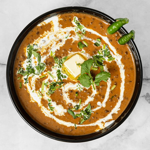 Mango juice in the glass on dark backgroud