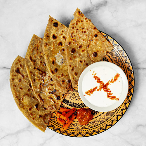 Mango juice in the glass on dark backgroud